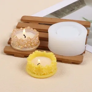 Silicone mold for flower wreath candle holders with finished yellow and gold wax samples
