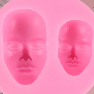 Dettaglio stampo in silicone viso umano rosa per decorazione torte e sapone fai-da-te