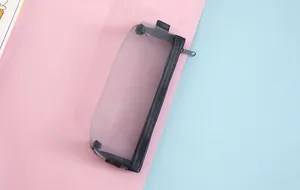 Macro view of transparent grey mesh pencil case with black zipper on pastel background