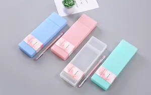 Detailed view of minimalist candy-colored PP pencil boxes in blue, pink, and mint green