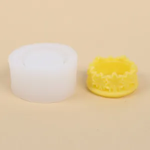 Silicone mold and finished yellow resin peach blossom wreath tray close-up detail