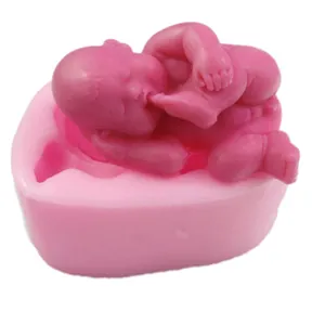 Detail view of 3D sleeping baby silicone mold for fondant and cake decorating