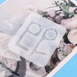 Close-up detail of a transparent silicone mold for crafting DIY non-contact keychain tools