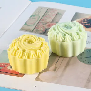 Detailed view showing the intricate floral textures of rose cupcake shaped aromatherapy candles