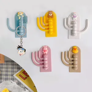 Set of creative cartoon adhesive wall hooks with three rotating arms for keys and coats