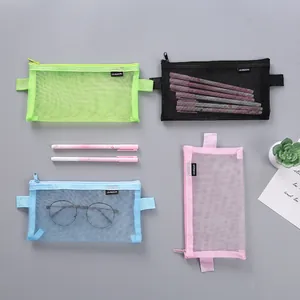 Assorted colors of translucent mesh pencil bags for students and office stationery