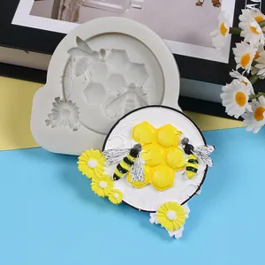 Detailed macro view of bee and honeycomb silicone mold for fondant cake decoration