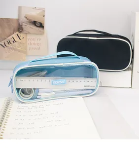 Close-up detail of a large capacity canvas pencil case with transparent window and handle strap