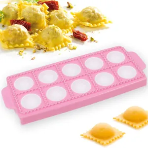 Detail of 10-hole pink ravioli mold showing finished pasta on white background