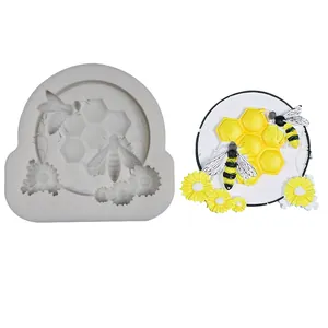 Silicone mold featuring bee and honeycomb designs for fondant and chocolate decoration