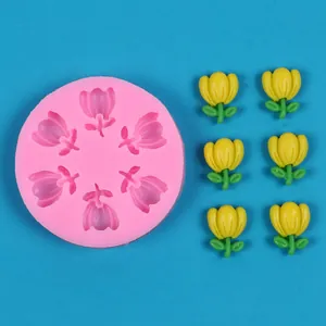 Detail view of pink tulip silicone mold with six yellow resin flower results