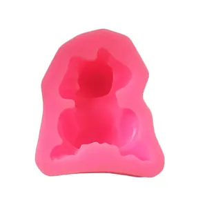 Detailed view of pink baby-themed liquid silicone mold for fondant cake decorating