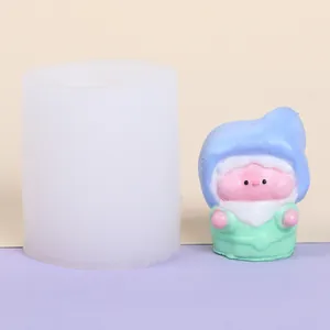 Detailed view of a 3D gnome silicone mold next to a finished colorful DIY candle figurine