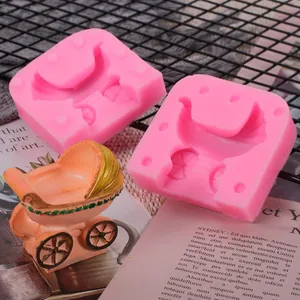 Detail view of pink baby carriage silicone fondant mold for cake decorating and DIY baking crafts