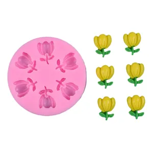 Detailed view of pink tulip flower silicone mold with finished yellow resin flower pieces