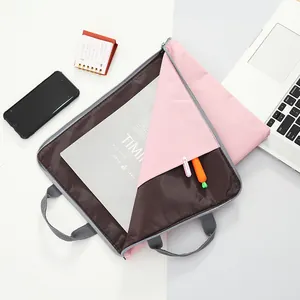 Minimalist pink and brown waterproof laptop bag for students and business professionals