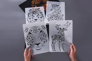 Macro view of flexible animal stencils showing tiger, deer and lion cutout details.