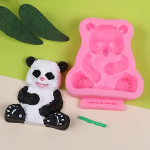 Detailed 3D panda silicone mold shown with a finished DIY resin panda and bamboo stick