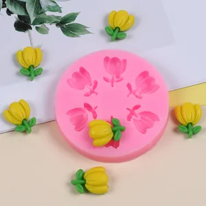Close-up of pink tulip-shaped silicone mold with yellow flower finished samples