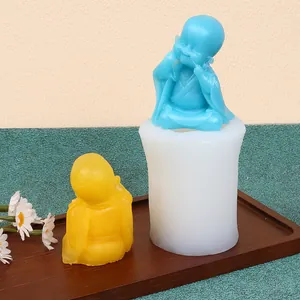 Detailed view of silicone mold for DIY smiling little monk candle and gypsum craft