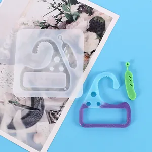 Close-up of silicone resin mold and finished gradient no-contact door opener tools