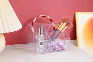 Macro detail of a transparent multi-compartment acrylic organizer for desk storage