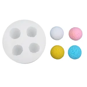 Detail of textured spherical silicone mold with colorful ice balls for drink decor
