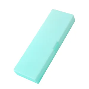 Minimalist mint green solid color PP pencil case with a secure snap closure for students.
