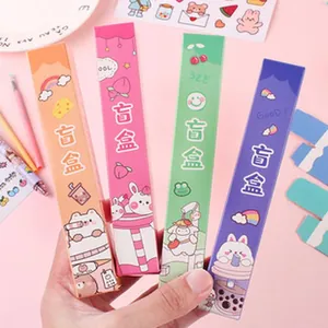 Close-up detail showing four colorful cute cartoon animal blind box pens for school students