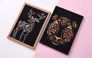 Detailed view of colorful animal scratch art featuring a deer and tiger in frames