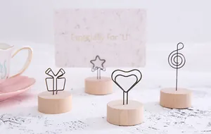Details of Zakka style wooden photo holders with creative metal wire heart and star shapes
