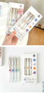 Set of 4 soft grip retractable black gel pens featuring cute space and floral patterns