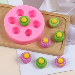 Pink round 7-cavity silicone mold for DIY mini desserts, chocolates, and aroma candles
