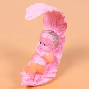 Macro view showing the intricate details of a pink baby feather cradle cake mold