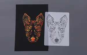 Detail view of an intricate mandala dog head stencil alongside its orange-yellow gradient artwork.