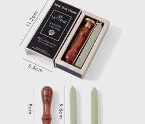 Detailed close-up of a vintage wax seal stamp gift set with specific size measurements