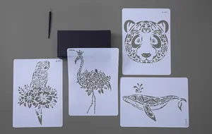 Detail view of animal painting stencils with panda and flamingo designs, including a stylus