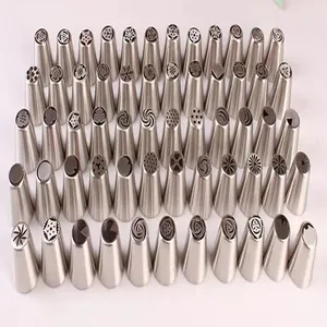 Detailed view of multiple stainless steel Russian piping tips for cake decorating