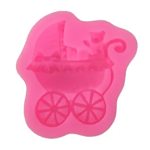 Pink silicone baby stroller mold detail view for DIY fondant cake baking decoration.