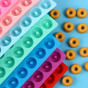 Colorful silicone donut molds with matching finished cakes shown in detail view