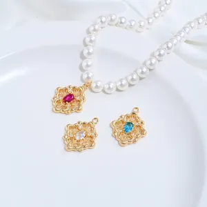 Close-up of 14K gold-filled pendants with colorful zircons for jewelry DIY projects