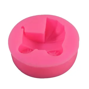 Detail view of a pink baby stroller shaped silicone mold for DIY baking and crafts