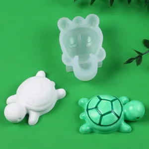 Detail of DIY mini turtle silicone mold with white and green finished resin ornaments