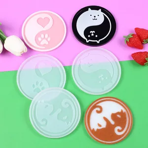 Close-up of DIY cartoon cat and paw pattern silicone resin coaster molds