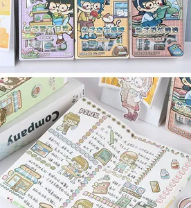 Detailed macro view of cartoon stickers applied to a grid journal page.