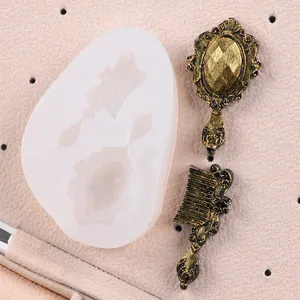 Close-up detail of mirror and comb silicone mold for fondant cake decoration