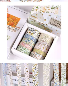 Macro detail of floral gold foil washi tape gift box set for decorative DIY journaling