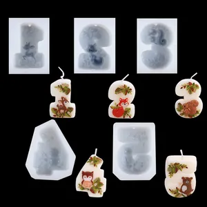 Detailed view of forest animal themed number silicone molds and finished candles 1-5