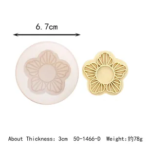 Detail view of flower silicone mold showing 6.7cm diameter and finished resin piece