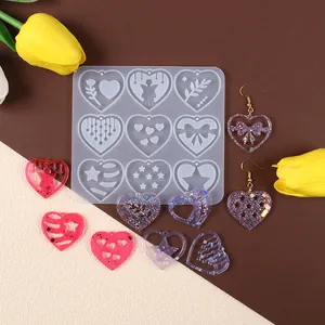 Vista dettagliata dello stampo in silicone a cuore a 9 cavità con orecchini in resina